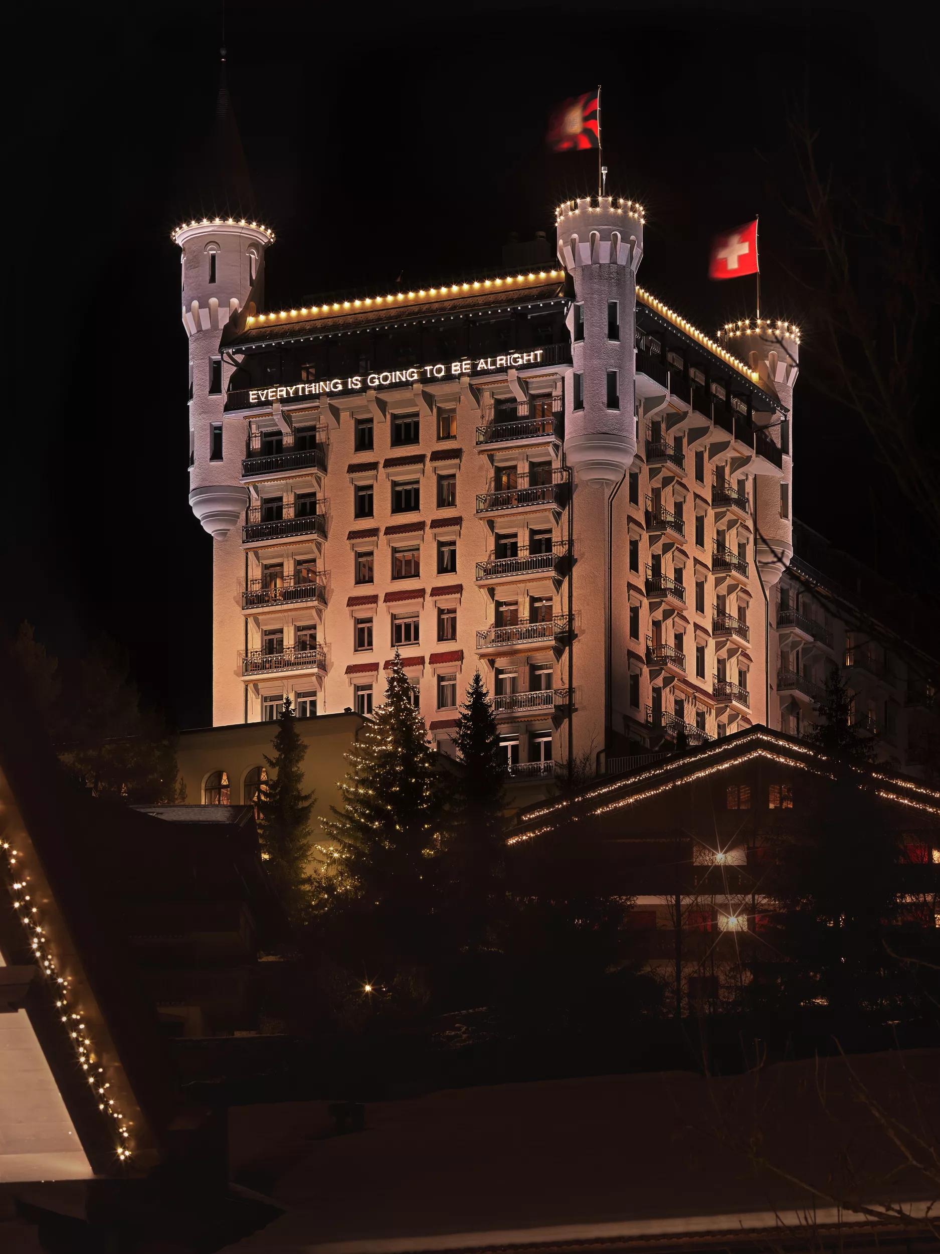 Hero image for article titled Martin Creed neon work unveiled at Gstaad Palace